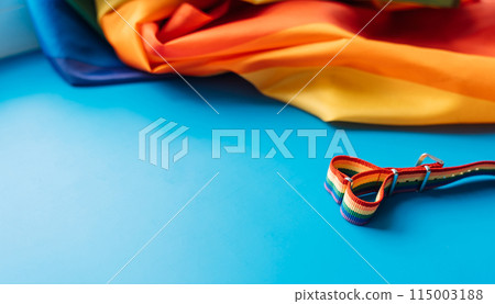LGBT flag and lanyard on blue background 115003188