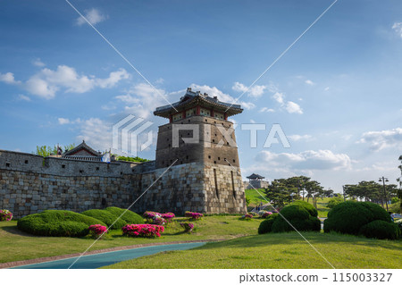 Old city wall at Hwaseong Fortress in summer, Traditional Architecture of Korea at Suwon, South Korea. Old city wall at Hwaseong Fortress in summer, Traditional Architecture of Korea at Suwon, South Korea. 115003327