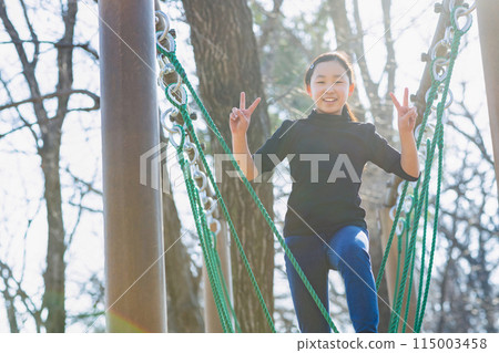 Elementary school girls enjoying athletics Elementary school girls enjoying athletics 115003458