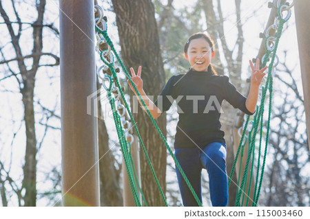 Elementary school girls enjoying athletics Elementary school girls enjoying athletics 115003460