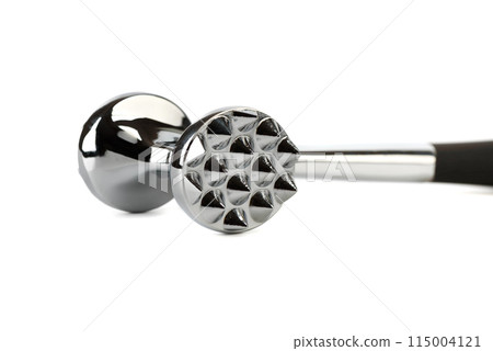 Close-up of a chrome-plated meat tenderizer hammer isolated on a white background. Close-up of a chrome-plated meat tenderizer hammer isolated on a white background. 115004121