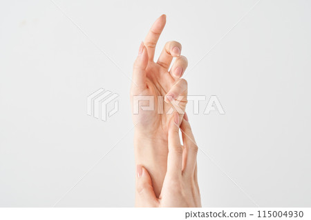 Woman's hands and white background 115004930