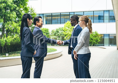 Group of multinational business people shaking hands Group of multinational business people shaking hands 115004951