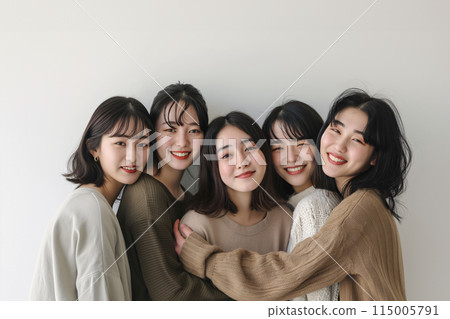 Group of Asian women wearing natural colored clothes. Beauty, health, fitness, togetherness, diversity Group of Asian women wearing natural colored clothes. Beauty, health, fitness, togetherness, diversity 115005791