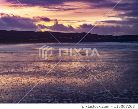 Beautiful sunset at Portnoo Narin beach in County Donegal - Ireland Beautiful sunset at Portnoo Narin beach in County Donegal - Ireland 115007208