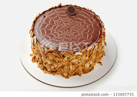 Classic Esterhazy cake with chocolate icing and almond flakes Classic Esterhazy cake with chocolate icing and almond flakes 115007735