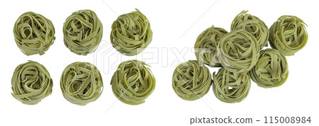 Raw tagliatelle green pasta with spinach isolated on white background. Top view. Flat lay Raw tagliatelle green pasta with spinach isolated on white background. Top view. Flat lay 115008984