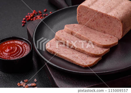 Delicious canned pink ham with salt, spices and herbs Delicious canned pink ham with salt, spices and herbs 115009557