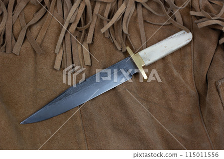 Old west bowie knife on leather jacket Old west bowie knife on leather jacket 115011556