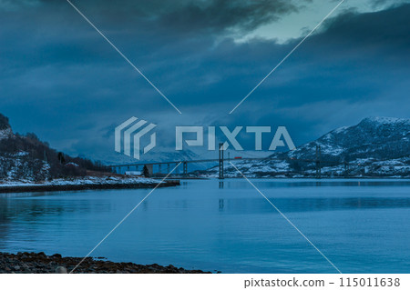 The iconic Tjeldsund bru bridge in the evening light, Lofoten, Norway 115011638