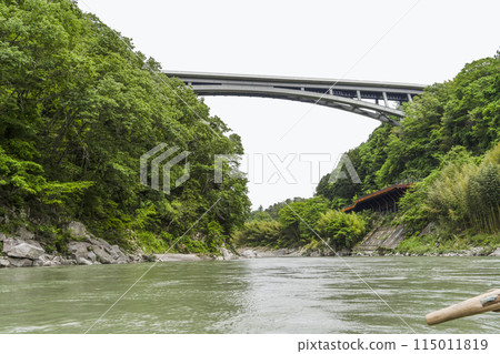 Tenryukyo Bridge seen from a boat on the river Tenryukyo Bridge seen from a boat on the river 115011819