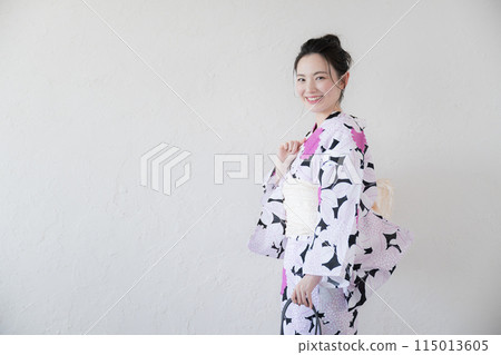 A woman wearing a yukata, white background 115013605