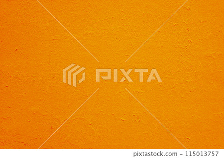 Abstract background of orange plaster on the wall. 115013757