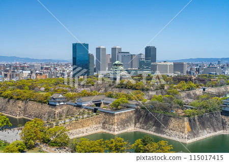 [Cityscape] Osaka Castle Park and the OBP buildings in spring [Osaka Castle Tower] 115017415