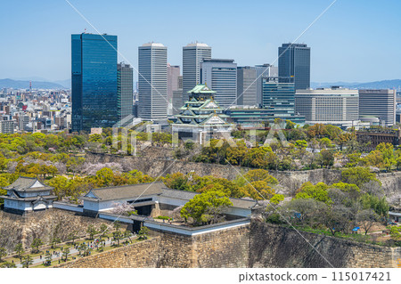 [Cityscape] Osaka Castle Park and the OBP buildings in spring [Osaka Castle Tower] 115017421