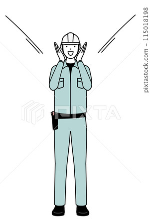 A man wearing a helmet and work clothes calls out to customers with his hand over his mouth 115018198