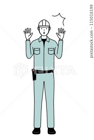 A man in a helmet and work clothes raising his hands in surprise 115018199