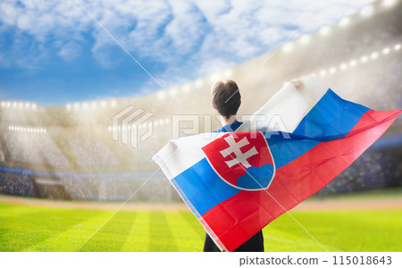 Slovakia football team supporter on stadium. 115018643