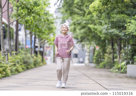 Senior woman walking 115019316