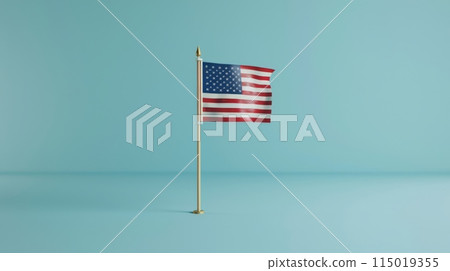 Small American flag on a pole against a light blue background. Minimalist and clean patriotic display. 115019355