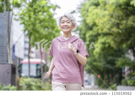 Senior woman walking 115019562
