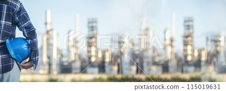 Banner Woman worker hands holding hardhat yellow work helmet Construction Engineer. Panorama Refinery woman worker industry hand hold yellow worker helmet hard hat. Refinery industry with copy space 115019631