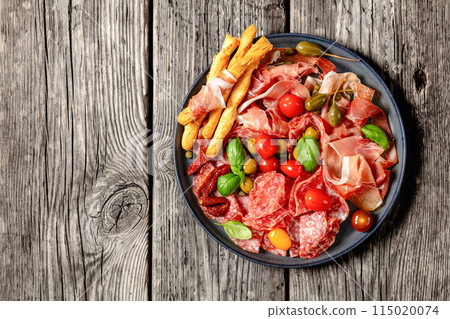 italian antipasto plate of cured meat and veggies italian antipasto plate of cured meat and veggies 115020074