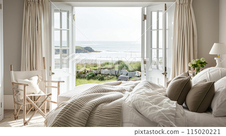 Beautiful interior of luxury bedroom with window sea view. Coastal cottage concept. High quality photo 115020221