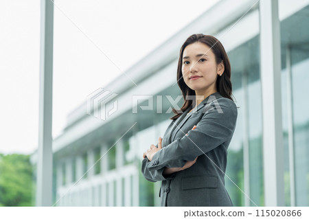 Business woman with arms crossed Business woman with arms crossed 115020866