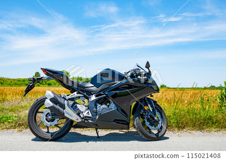 Early summer motorcycle touring: Wheat fields and blue skies a-1 115021408