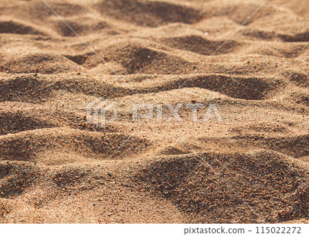 Orange waves of beach and desert sand with blur with sunset or morning light. Nature background 115022272