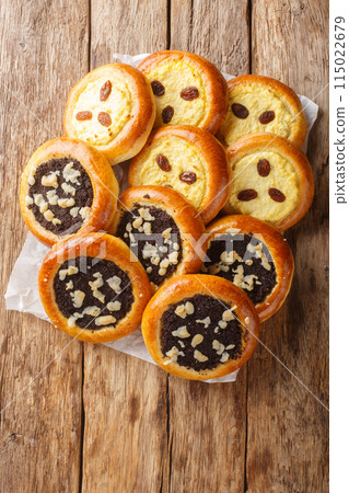 Authentic Czech kolache made with cottage cheese or poppy seeds closeup. Vertical top view 115022679