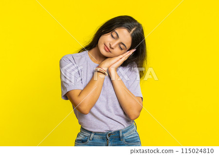 Tired exhausted Indian woman yawning, lazy bored lack of sleep, falling asleep, take a break, relax 115024810