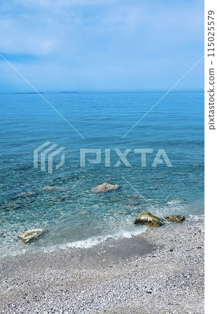 Rocky beach and crystal turquoise water of Ionian Sea in Albania.  115025579