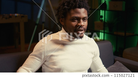 African american gamer winning game after killing all foes in game, punching air from happiness. Joyful player celebrating, feeling excited after being victorious in SF videogame African american gamer winning game after killing all foes in game, punching air from happiness. Joyful player celebrating, feeling excited after being victorious in SF videogame 115027121
