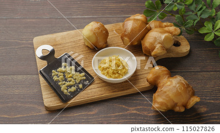 Ginger and grater | Grated ginger image Ginger and grater | Grated ginger image 115027826