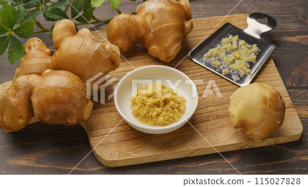 Ginger and grater | Grated ginger image Ginger and grater | Grated ginger image 115027828
