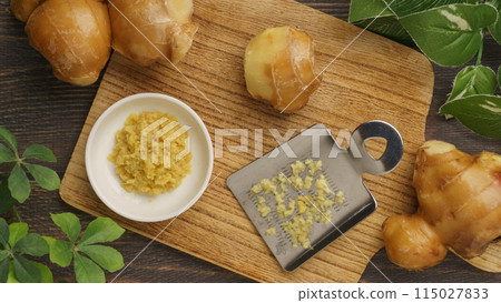 Ginger and grater | Grated ginger image Ginger and grater | Grated ginger image 115027833