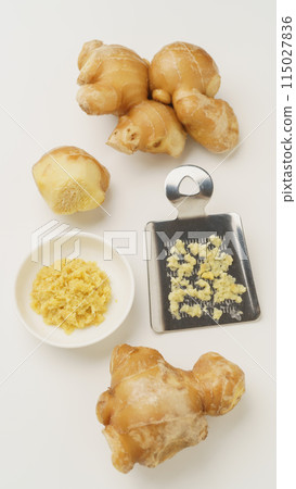 Ginger and grater | Grated ginger image Ginger and grater | Grated ginger image 115027836