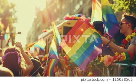Crowd celebrating with rainbow flags at a public event 115028565