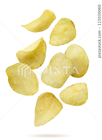 Potato chips falling on a white background. Isolated Potato chips falling on a white background. Isolated 115030060