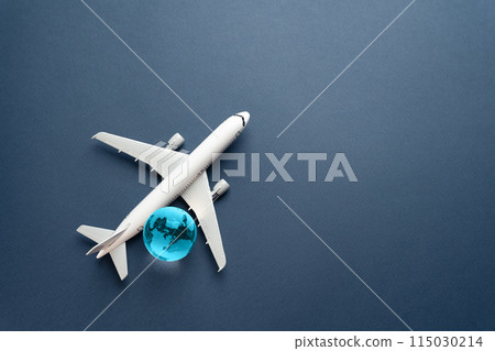 Airplane and blue globe. Travel and business trips. Transport system and infrastructure. Air communication. World flight routes. Development of civil aviation. 115030214