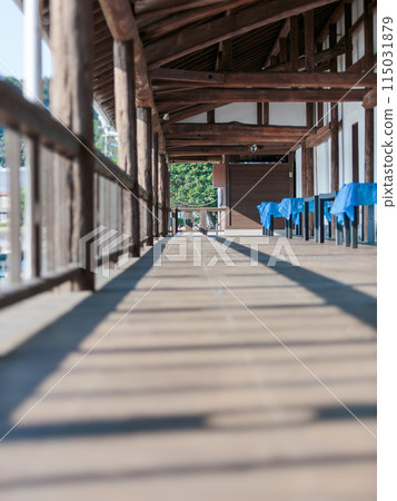 walk down a long corridor walk down a long corridor 115031879