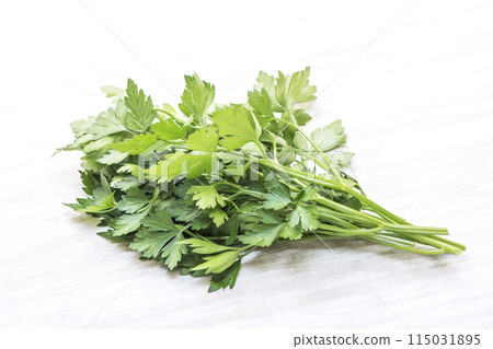 Fresh Italian parsley, green and yellow vegetables, green herbs, freshly picked Italian parsley, healthy vegetables, aromatic vegetables 115031895