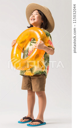 Smiling girl holding a swim ring, straw hat, aloha shirt, summer vacation 115032044