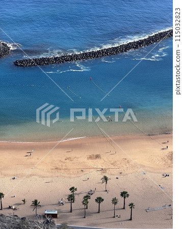 Top view of Las Teresitas beach with yellow sand. Near the city of Santa Cruz de Tenerife, Tenerife, Canary Islands. 115032823