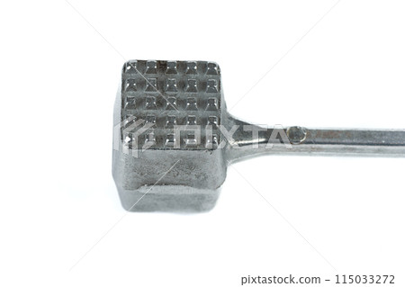 Close-up of a meat mallet with frequent spikes. Close-up of a meat mallet with frequent spikes. 115033272