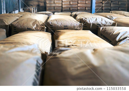 Warehouse full of paper sacks with tea. Warehouse full of paper sacks with tea. 115033558