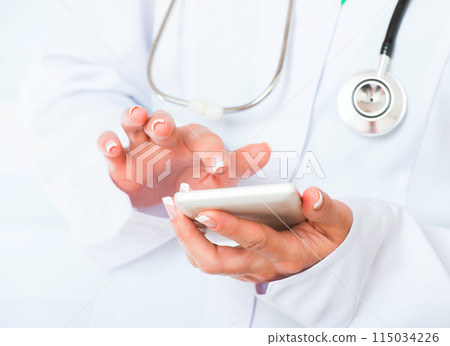 Doctor's hands with mobile phone Doctor's hands with mobile phone 115034226