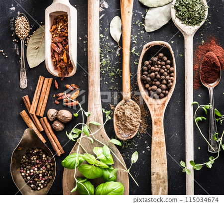 wooden spoons with spices and herbs 115034674